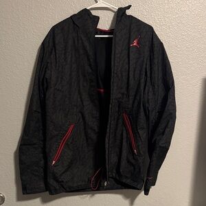 Jordan Men's Black Windbreaker with Red Accents